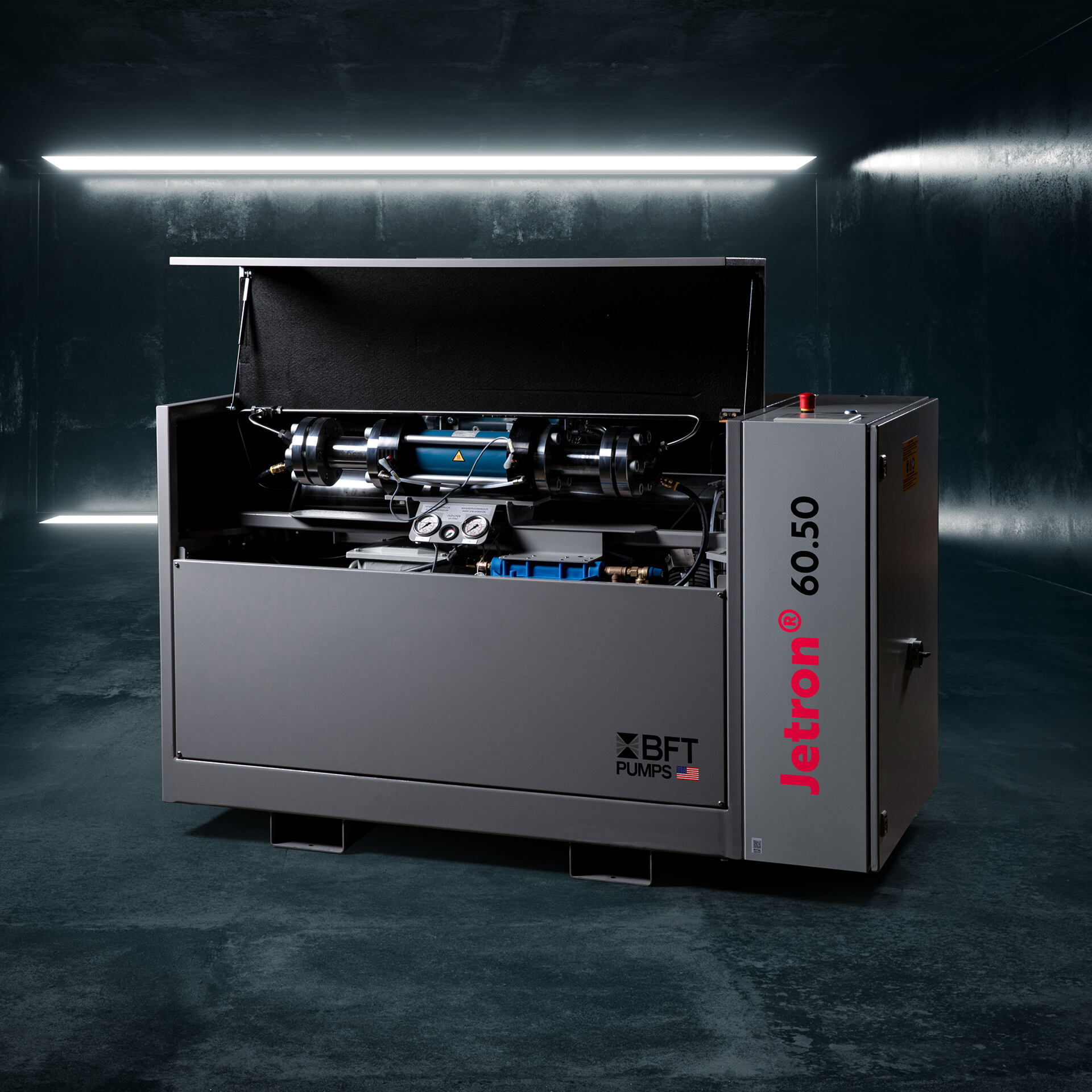 BFT Jetron 60.50 high-pressure pump with open housing and visible intensifier components for industrial waterjet applications.